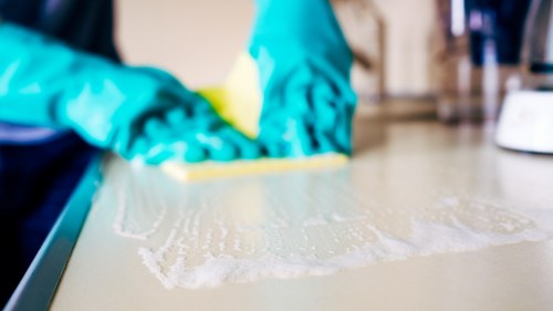 Cleaning process with machine and treated carpet surface